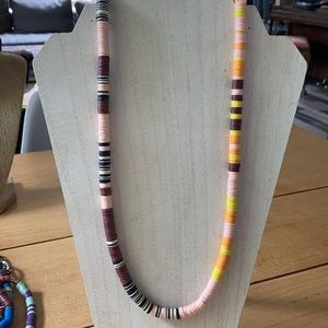 Handmade African vinyl beaded necklace.